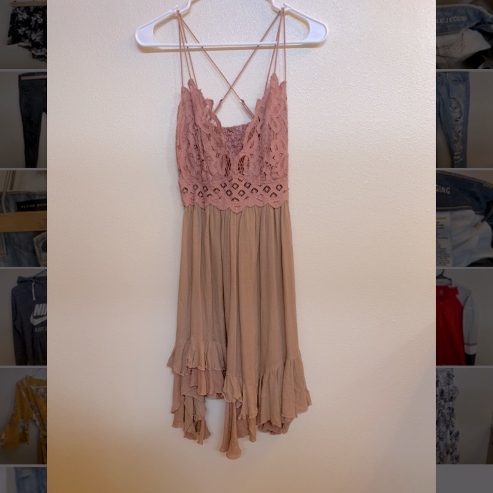 Flowy dress. Pink-mauve color. Size medium